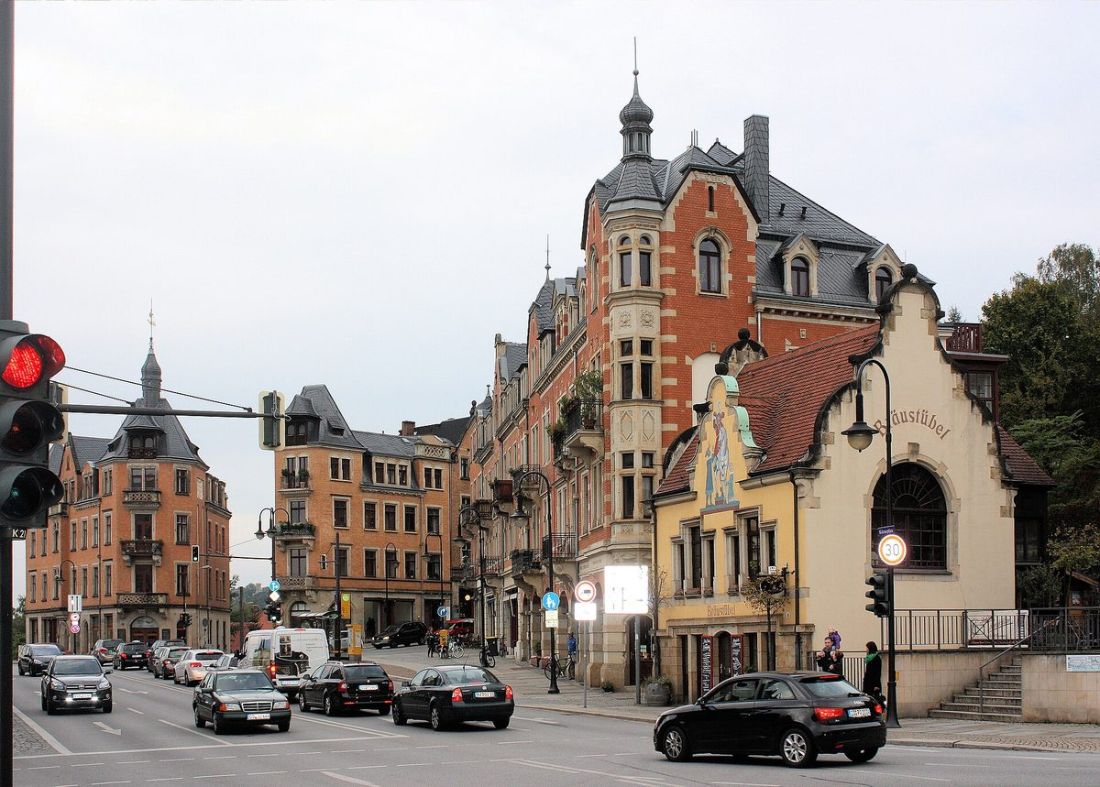 Körnerplatz square in Dresden Loschwitz with historic buildings and the Elbe slope behind